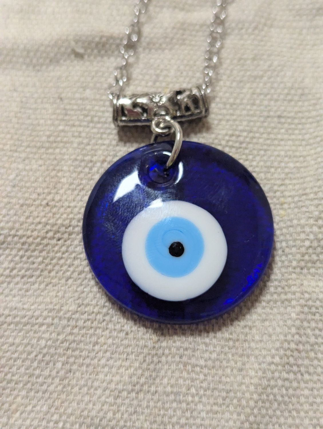 Silver-colored Evil Eye Pendant