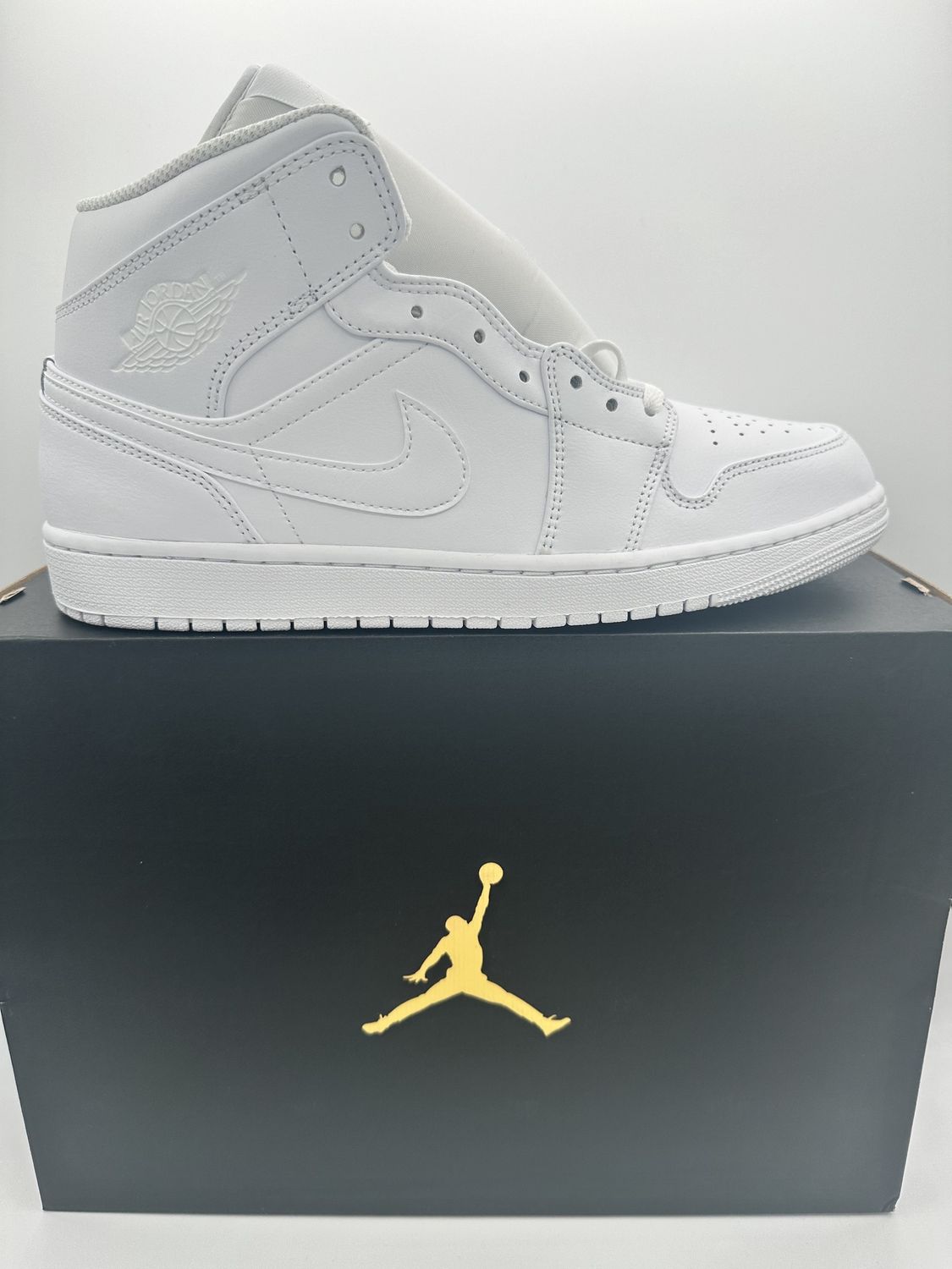 Jordan 1 Mid - Triple White