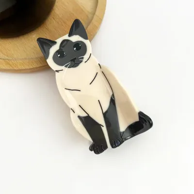 Sitting Cat Hair Claw Siamese cat