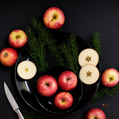 Organic Gala apples with crisp texture, red-golden skin and naturally sweet flavour, freshly sourced for healthy snacking.