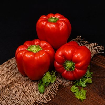 Organic red bell pepper (red capsicum), fresh and crisp, also called red Shimla mirch, from Sanesa, Delhi NCR.