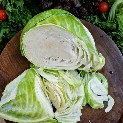 Organic green cabbage (patta gobhi), fresh crisp layered leaves, chemical-free cabbage from Sanesa, Delhi NCR.