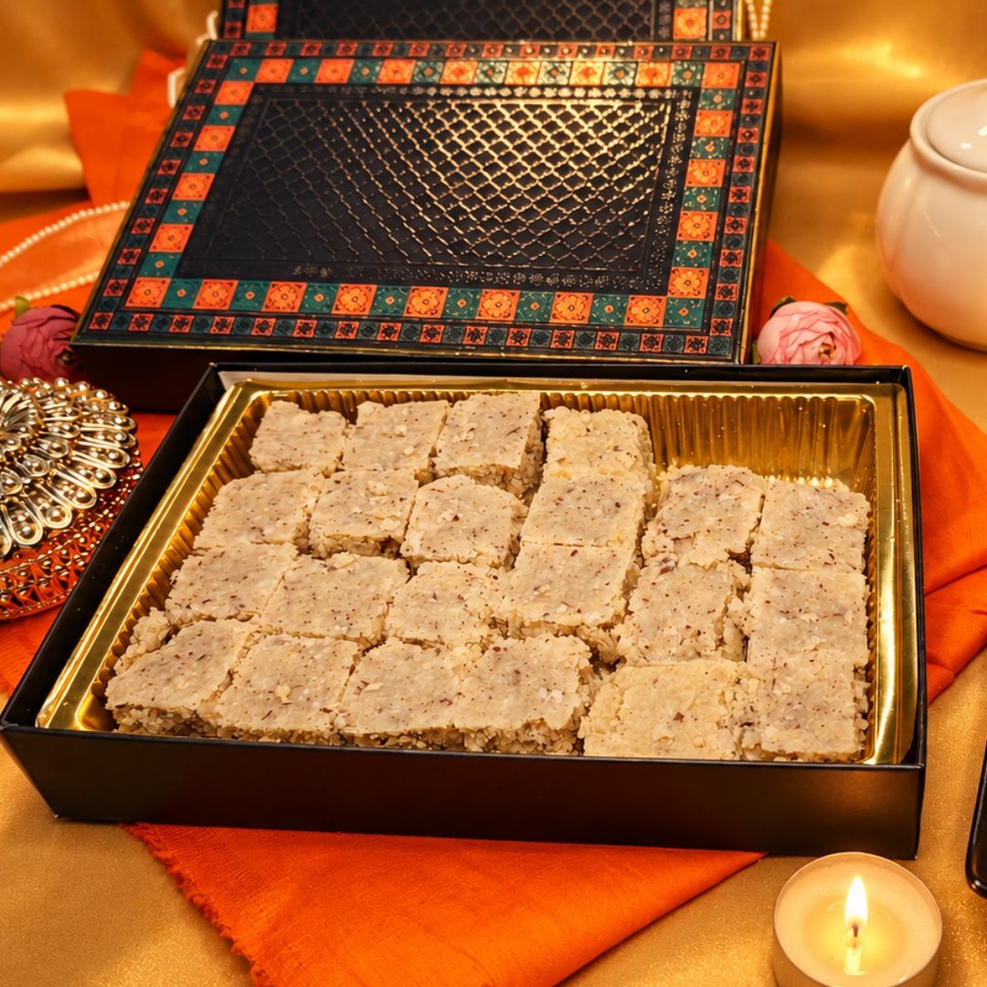 Festive Purple MEDIUM gift box with sweets, gold tray, patterned lid and glowing Diwali diya.
