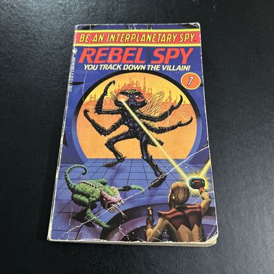 Neufeld, Len (GN) Be an Interplanetary Spy #7 Rebel Spy (1984, PB)