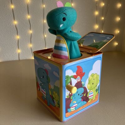 Schylling Baby Dino Jack in the Box (Tin Musical Toy)