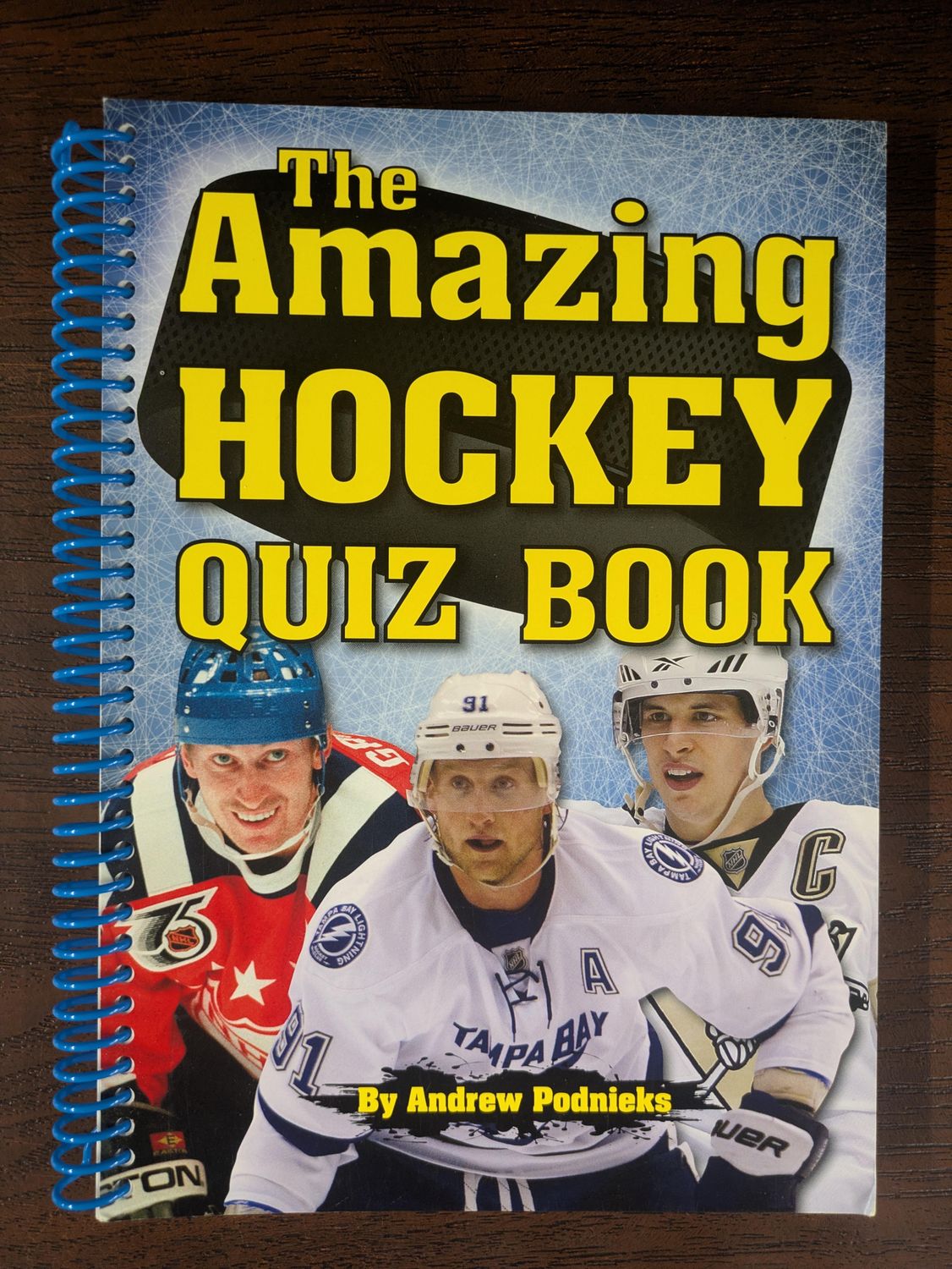 Podnieks, Andrew (796.96) The Amazing Hockey Quiz Book (Blue Spiral)