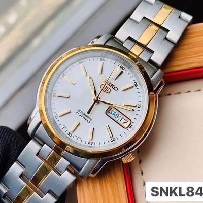Men’s automatic Seiko 5 SNKL84K1 38 mm – Hardlex, 30 m, two-tone steel bracelet