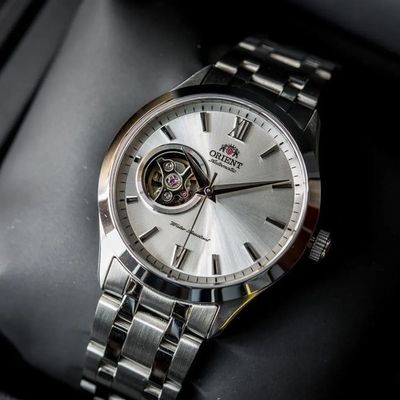 Men’s automatic ORIENT Contemporary Open Heart TAG03001W 38.5 mm – Sapphire, 50 m, steel bracelet