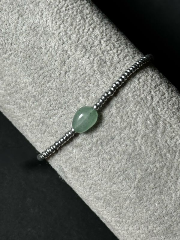 Bracelet Seed Beads with a Green Gem