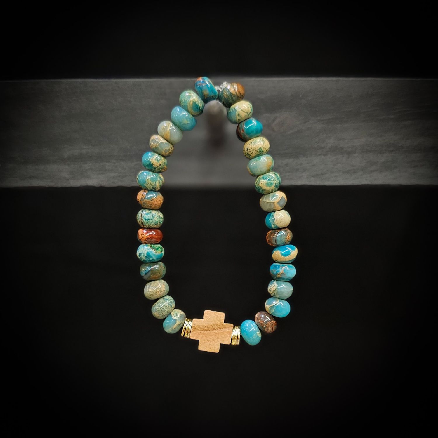 ISRAELI OLIVE WOOD CROSS  BLUE MULTI  BEAD BRACELET