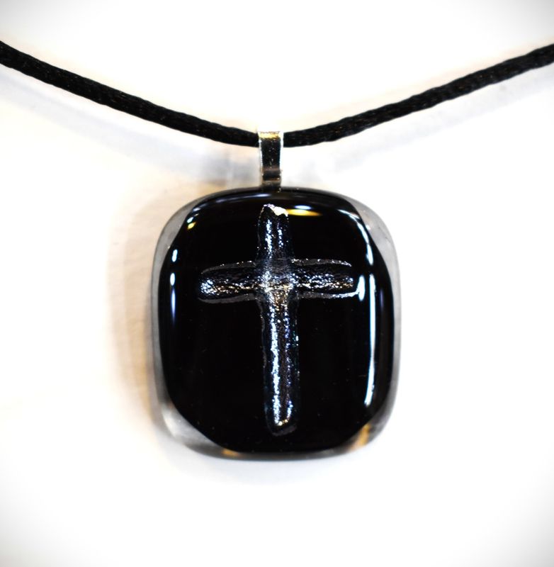 Silver Cross on Black Background
