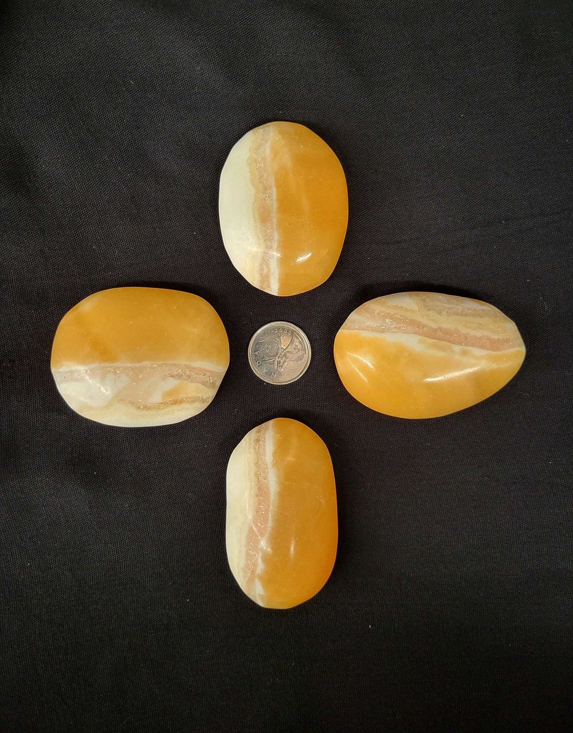 Orange Calcite Palm Stone $29