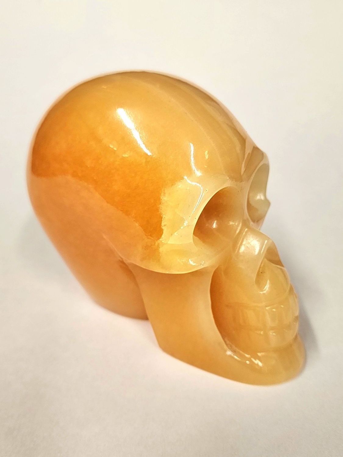 Orange Calcite Skull 6in