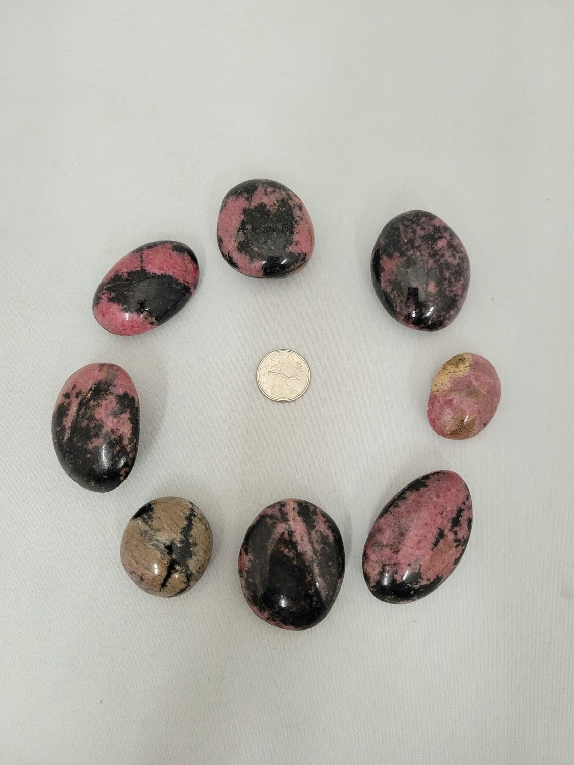 Rhodonite Palm Stones $11
