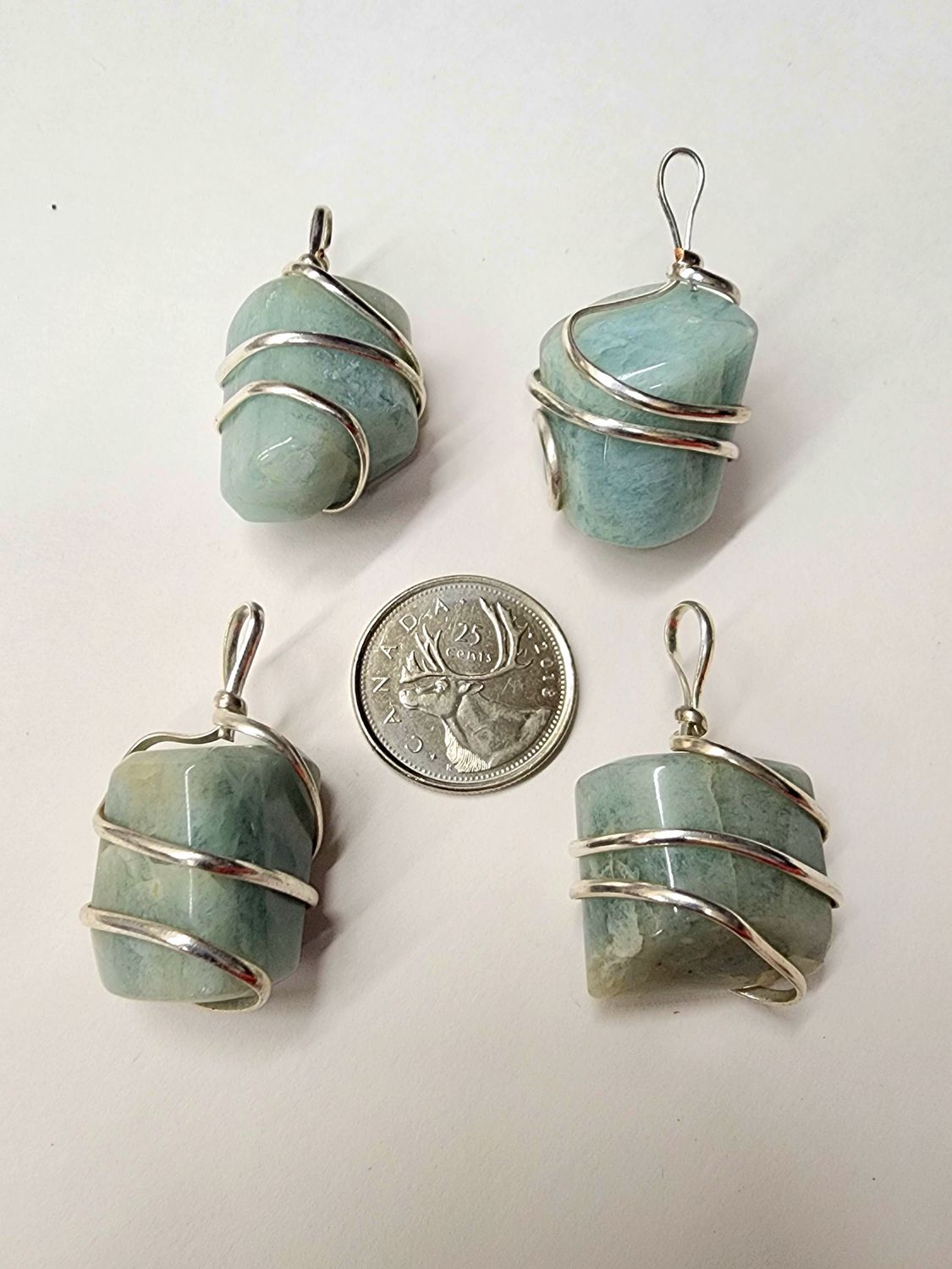 Aquamarine Wrapped Pendants on Black Cord