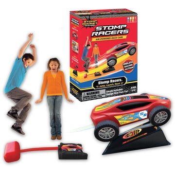 Child stomping on launcher, sending a Stomp Racer car over a jump ramp.