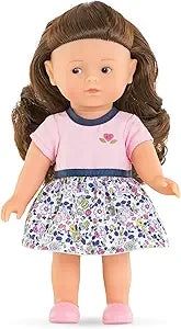 Front view of Mini Corolline Romy Anniversary Edition doll in floral dress