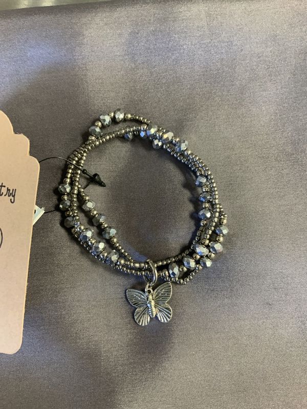 TRIPLE STRAND CRYSTAL BRACELET WITH BUTTERFLY CHARM