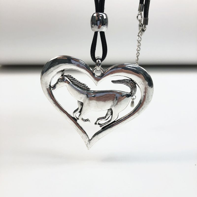 NL060-A1052  Leather rope necklace w/heart and horse