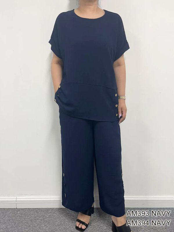 AM394 Elastic draw string waist flowy capri w/side button detail and pockets