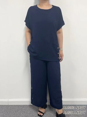 AM394 Elastic draw string waist flowy capri w/side button detail and pockets
