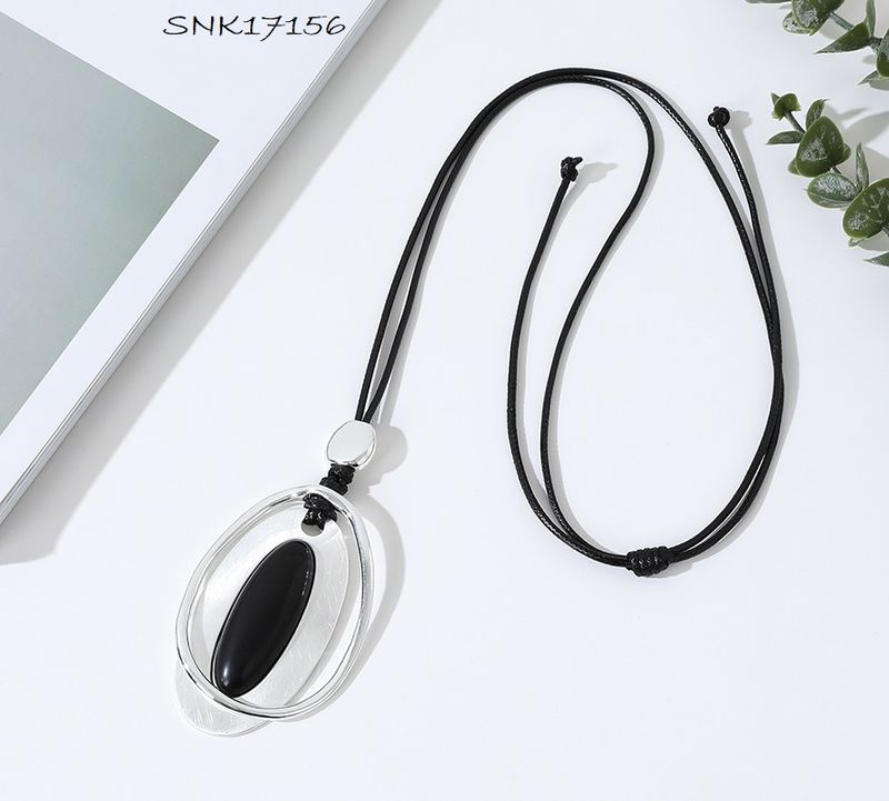 SNK-17156 Leather rope necklace w/oval pendant