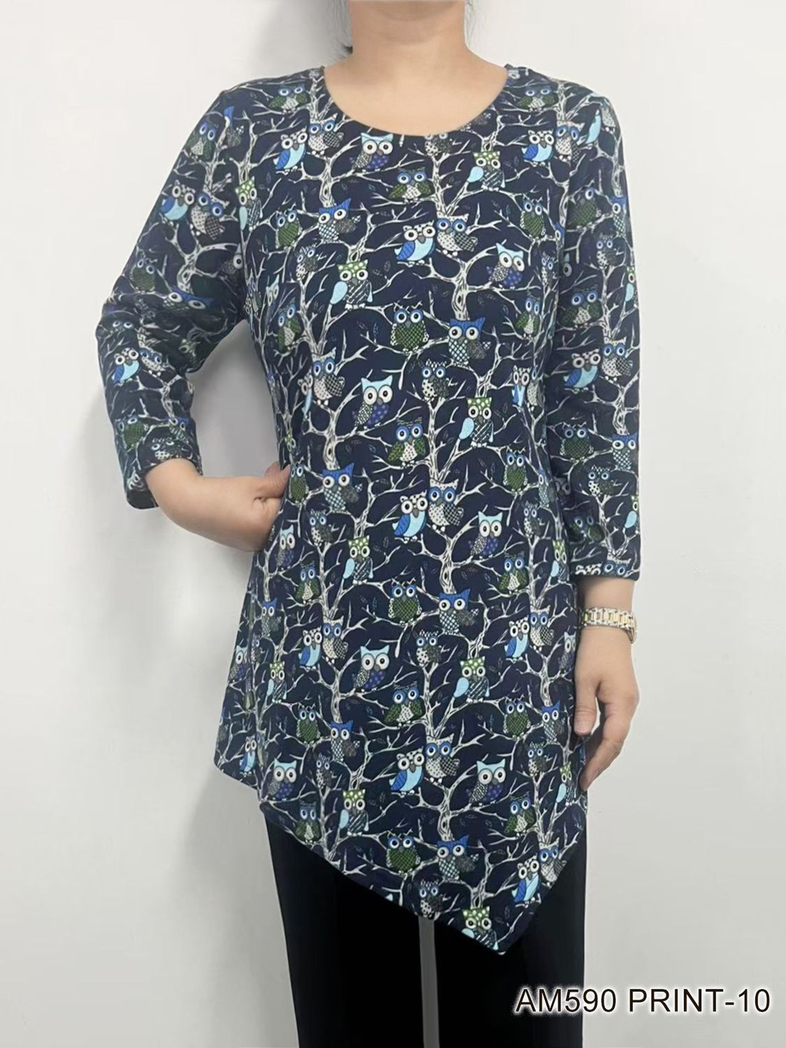 AM590 Asymmetrical pullover owl print top