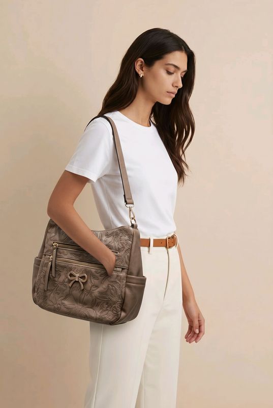 TO431-2 hobo style shoulder bag w/bow on front and extra strap