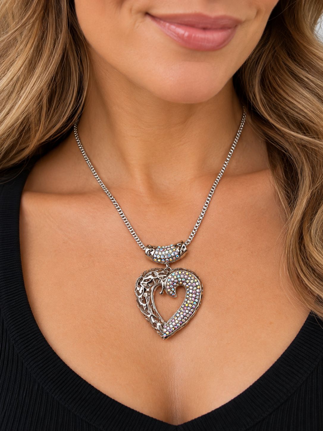 Silver tone heart necklace with rhinestones