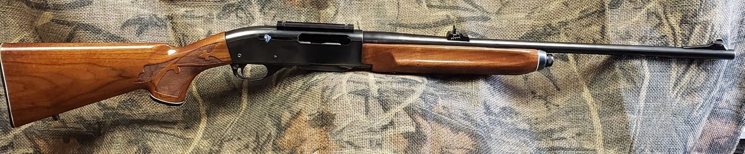USED REM 7400 270WIN WOOD SEMI AUTO