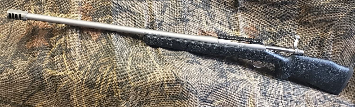 700 LONG RANGE EXPRESS 7MM W/ MUZZLE BREAK
