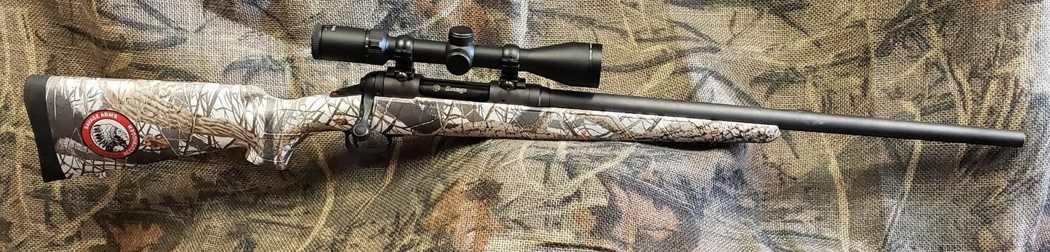 USED SAV 11 PREDATOR 22-250REM SNW CAMO PKG