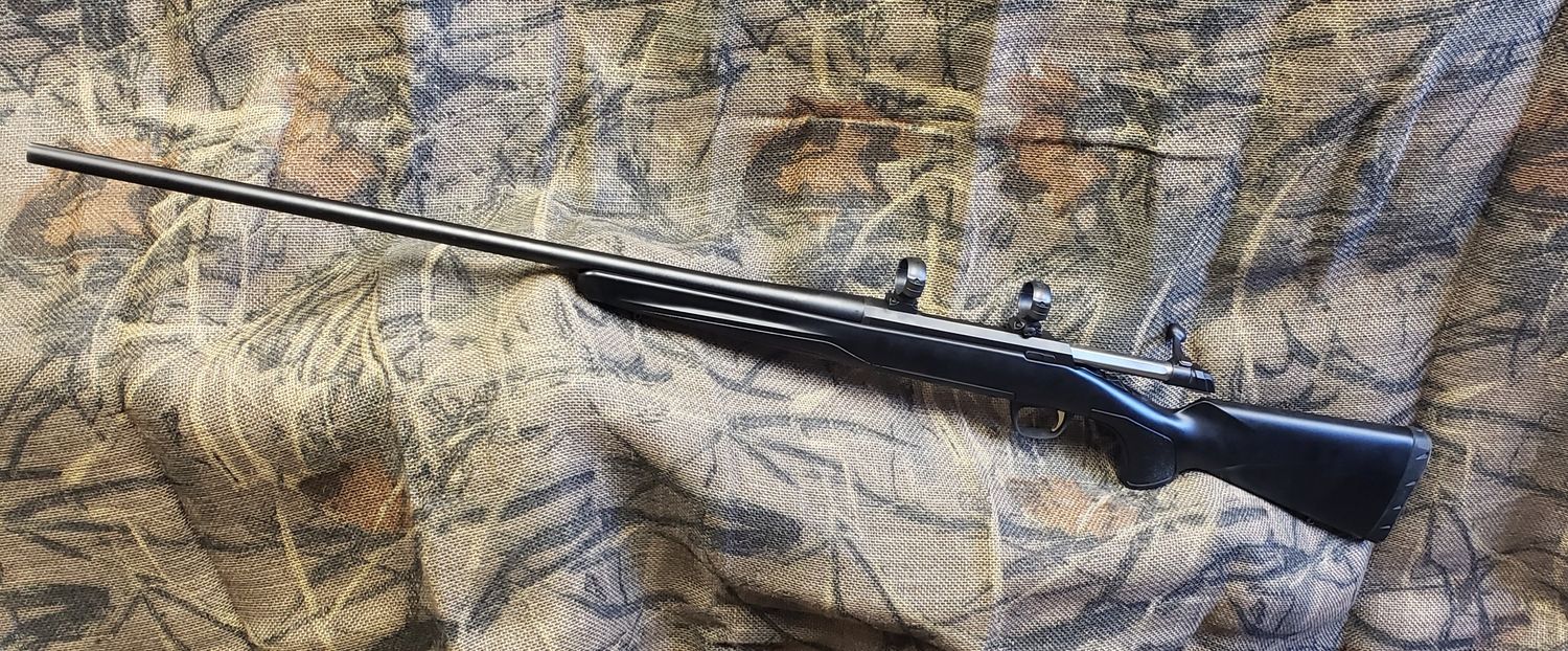 USED BRWN X-BOLT COMP STALKER 7MM W/ LEUPOLD RINGS