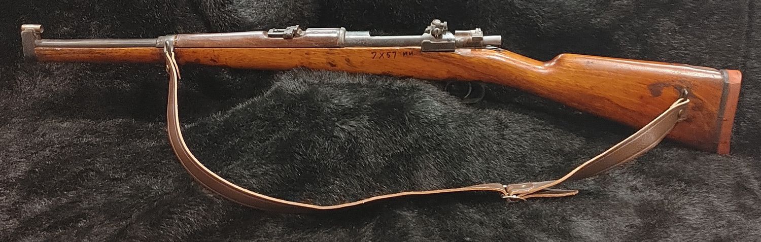 USED FABRICA ARMS CVDA 1889 7X57MM WOOD BOLT