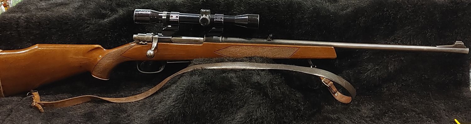 USED PH 30-06 WOOD BOLT W/ SCOPE