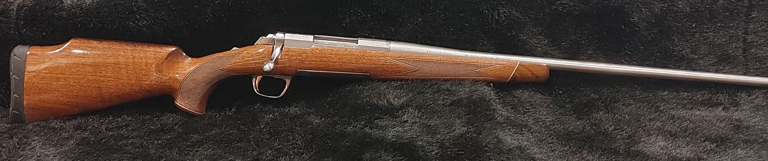 USED BRWN X-BOLT WHITE MEDALLION 300 WSM WOOD BOLT