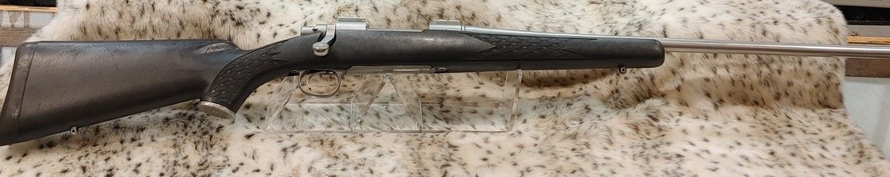 REM 700 7MM RUM SS / BLACK SYNTHETIC BOLT