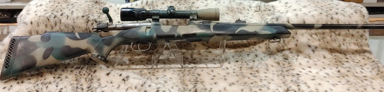 USED REM MAUSER 308WIN CAMO WOOD PKG