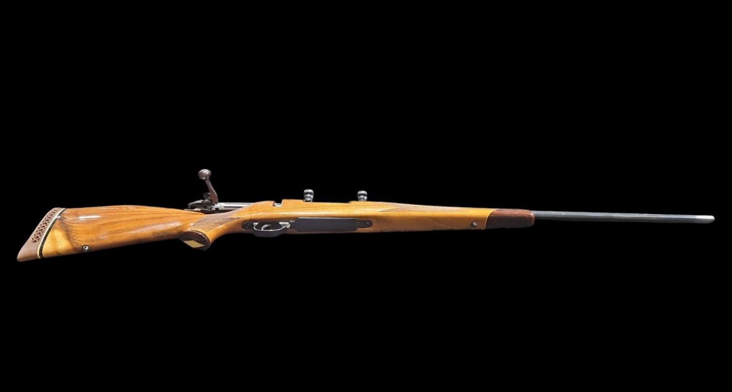 USED WBY MARK-V DLX 300WBY WOOD BOLT ACTION W/ RINGS