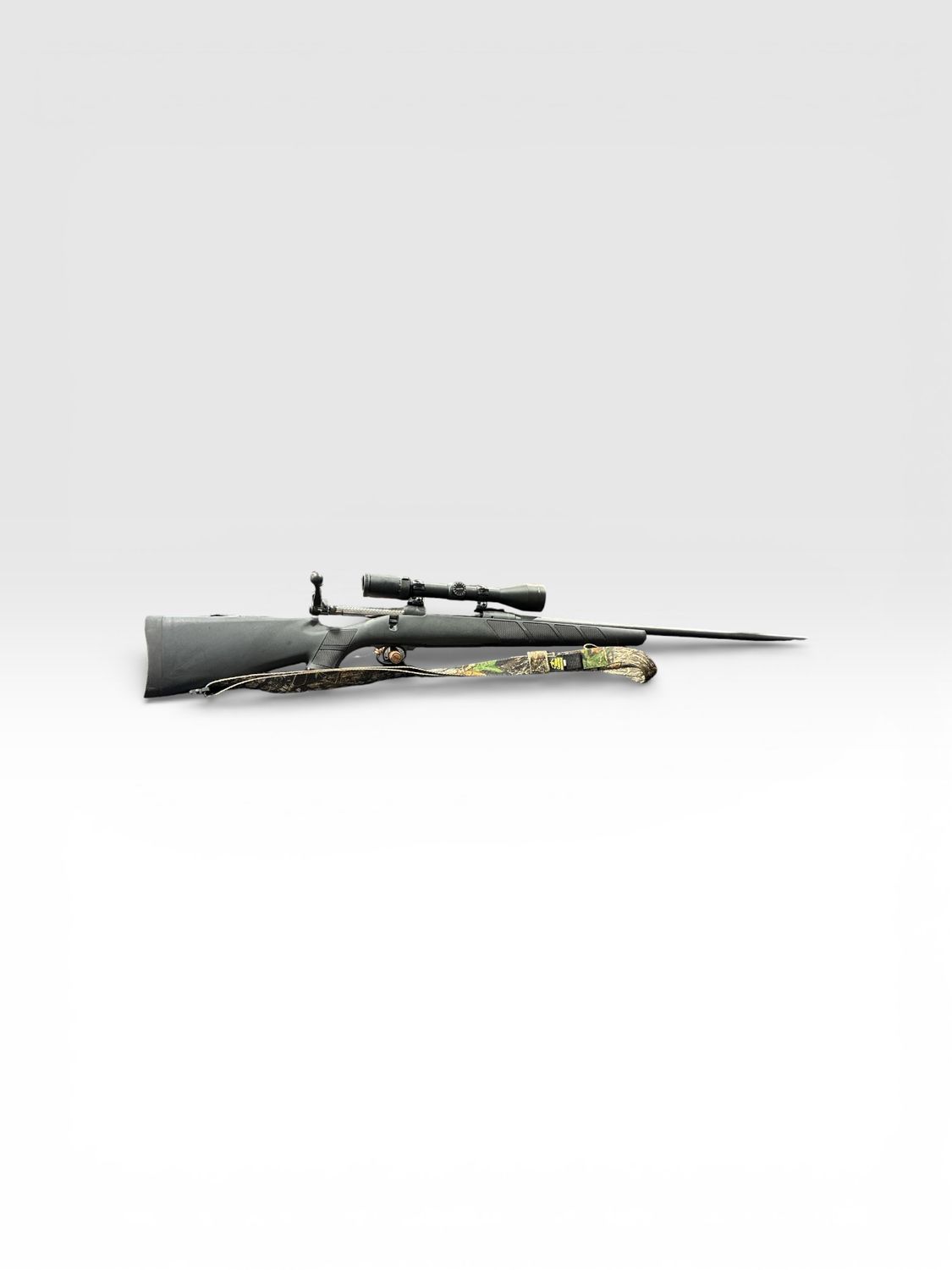 USED SAV 111 7MM SYNTHETIC CAMO BLACK BOLT ACTION PKG W/ WEAVER 3-9X40