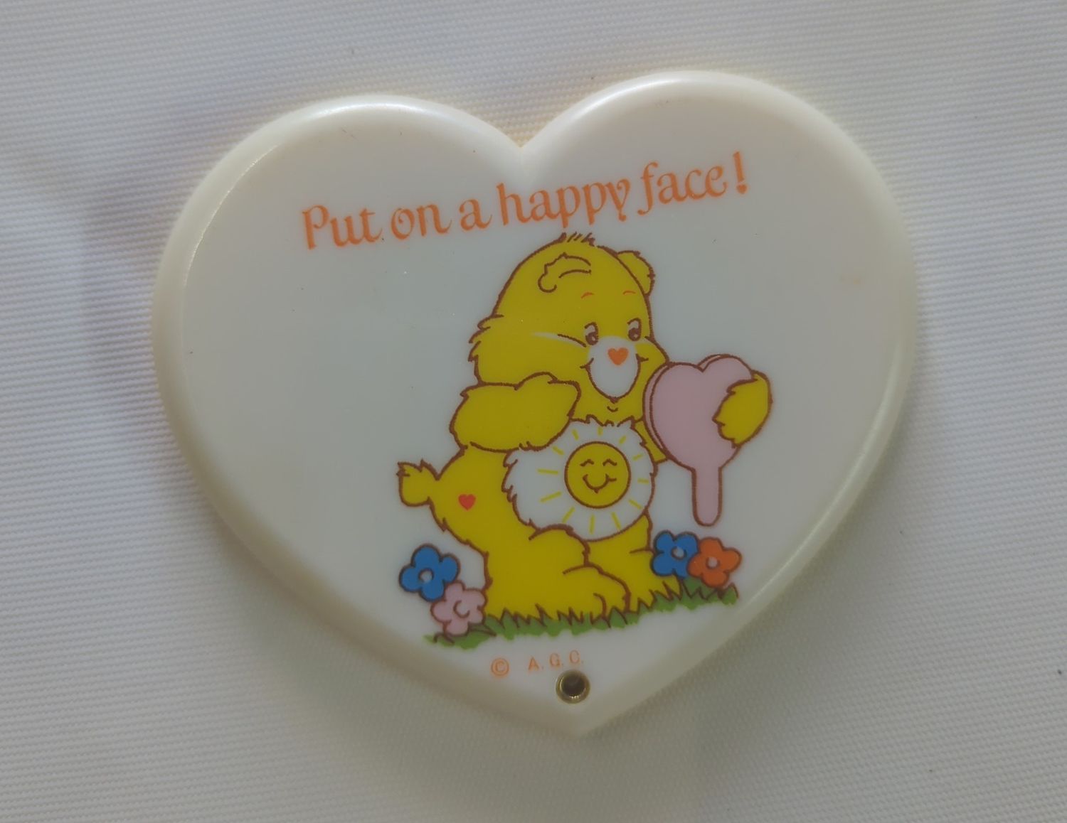 Care Bears Pocket Mirror Yellow Heart ( Put on a happy face)