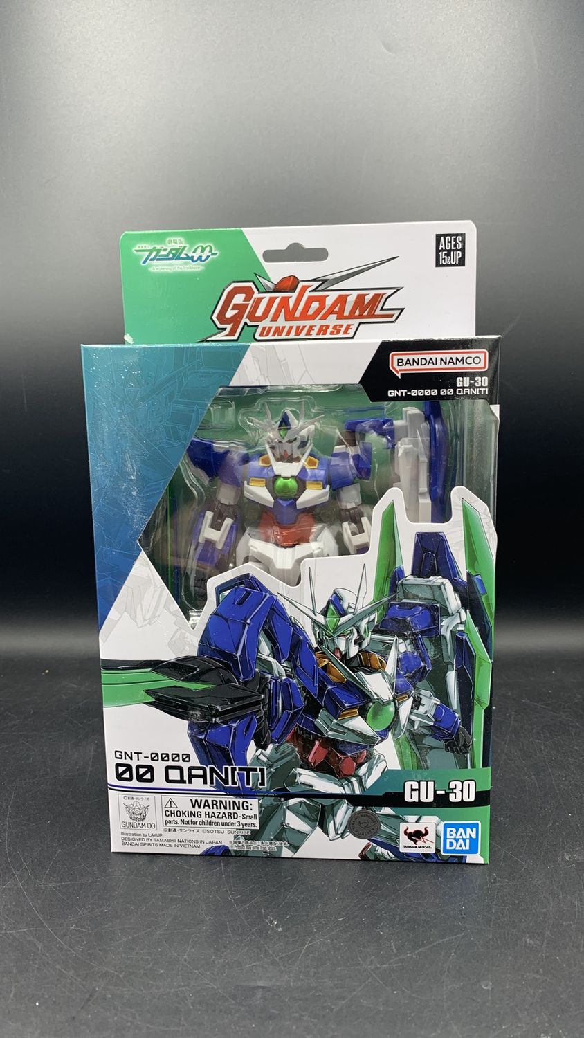 Bandai Mobile Suit Gundam Awakening of the Trailblazer GNT-0000 00 QAN[T] Figure