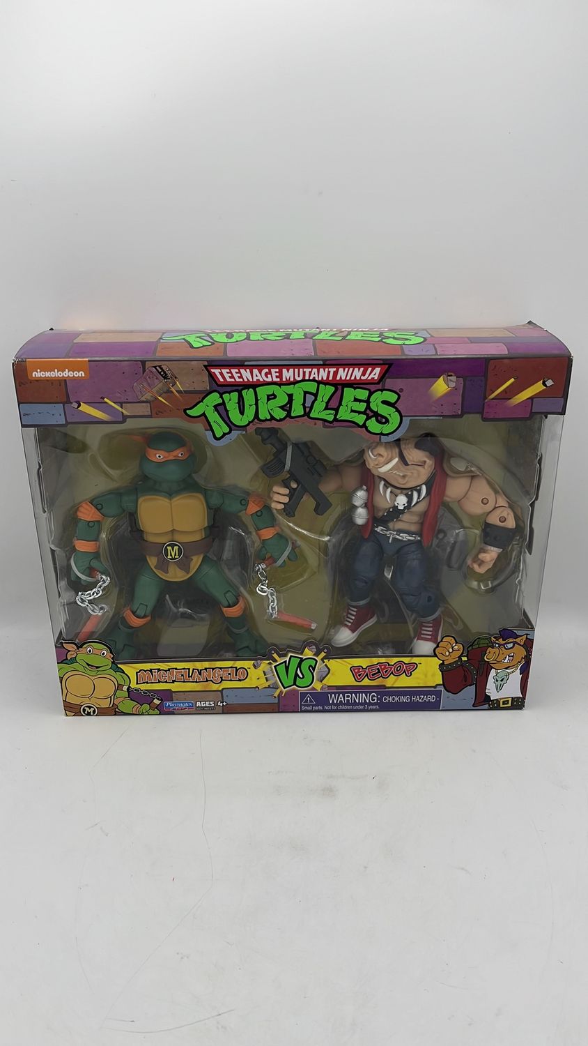 Playmates Teenage Mutant Ninja Turtles Michelangelo vs Bebop Figures 2021