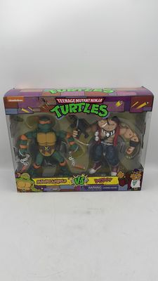 Playmates Teenage Mutant Ninja Turtles Michelangelo vs Bebop Figures 2021
