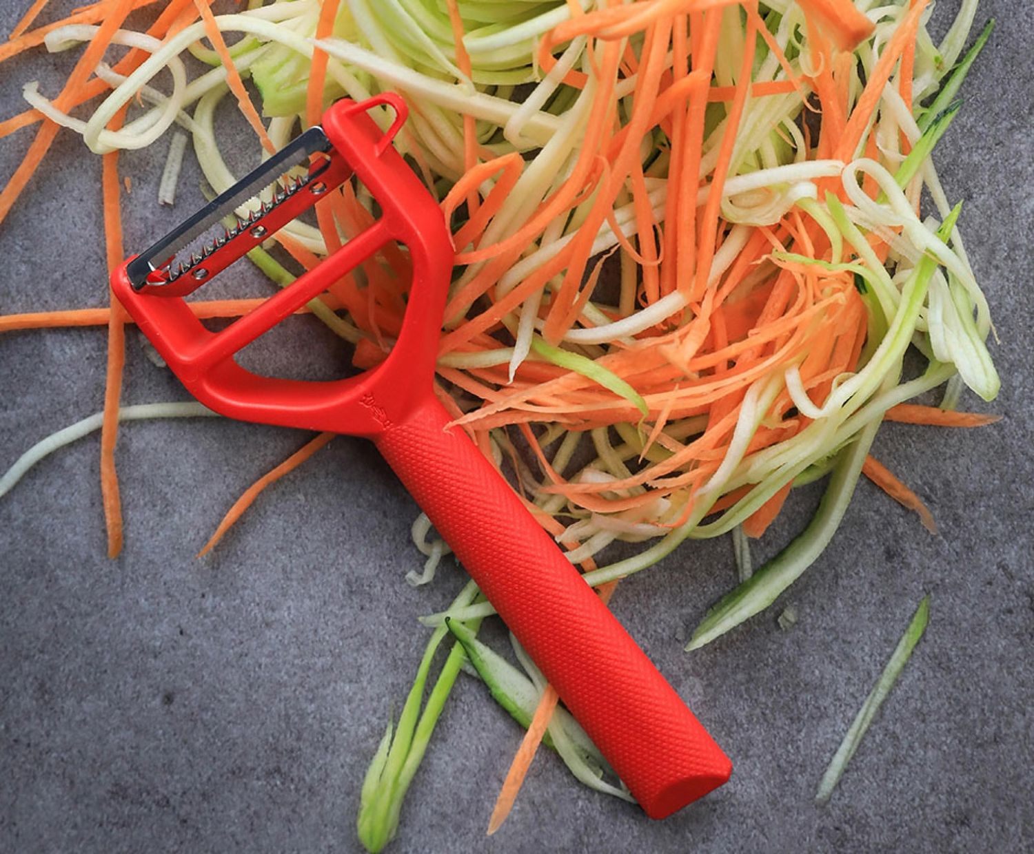 Eplucheur T DUO bois et rouge pour droitiers + gauchers