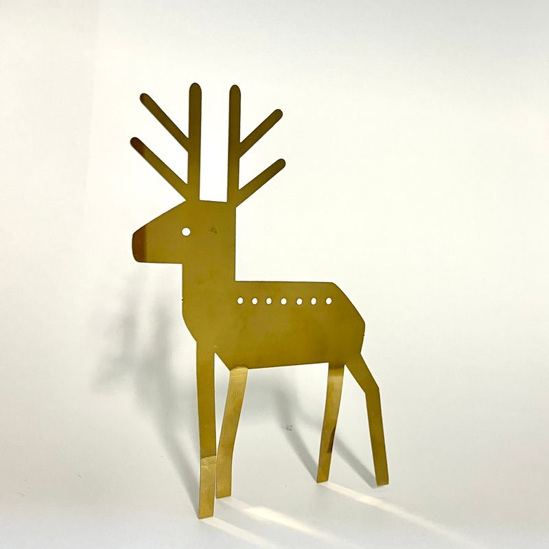 Lite reinsdyr i gull