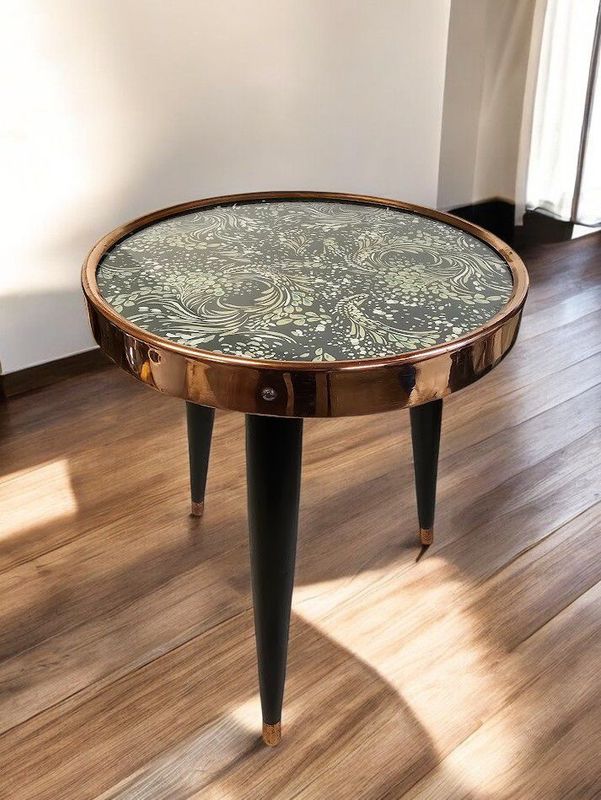 A vintage 3 legged small copper framed side table with dancette style legs