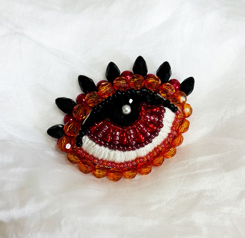 Tangerine Eye brooch
