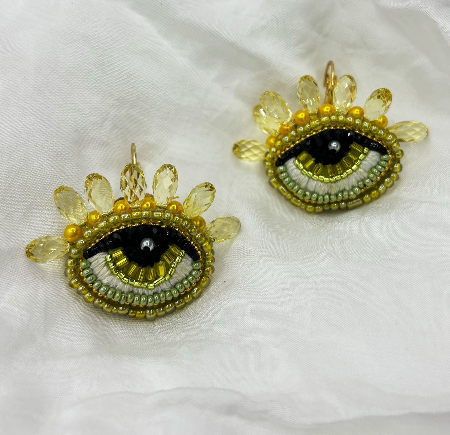 Greenish yellow Eye earrings