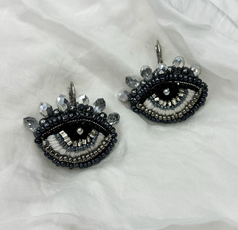 Old silver Eye earrings